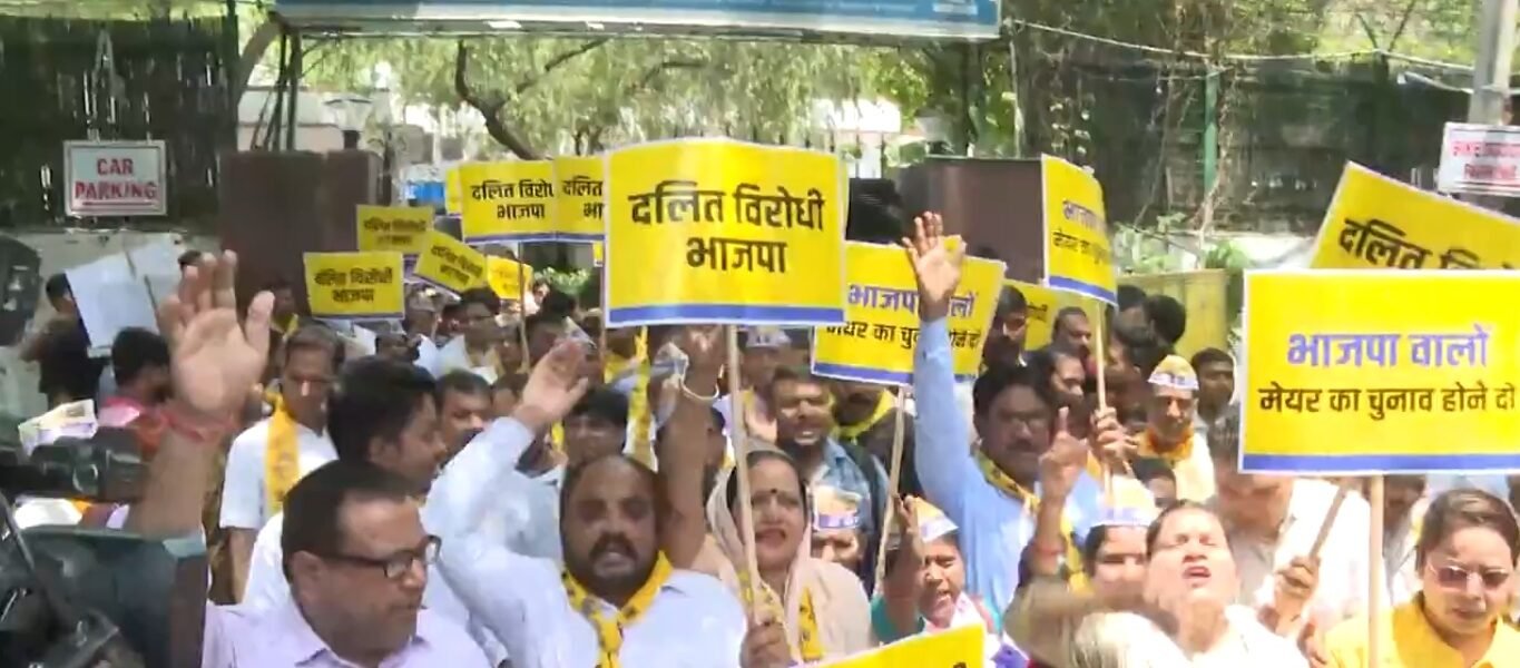 Aam Aadmi Party demonstrated outside BJP headquarters against postponement of MCD elections.