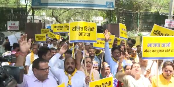 Aam Aadmi Party demonstrated outside BJP headquarters against postponement of MCD elections.