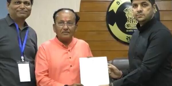 BJP candidate from Surat Lok Sabha seat Mukesh Dalal receives his victory certificate after being elected unopposed.