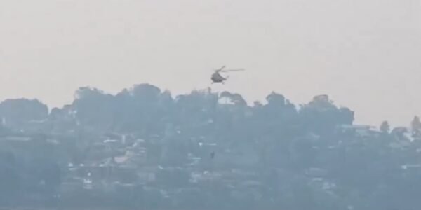 IAF sprinkled water from MI-17 helicopter to extinguish forest fire in Nainital, Uttarakhand