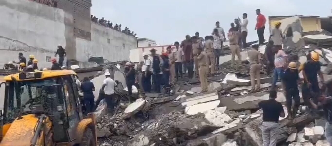 Seven people were killed when a six-storey building collapsed in Surat's industrial area yesterday