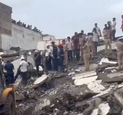 Seven people were killed when a six-storey building collapsed in Surat's industrial area yesterday
