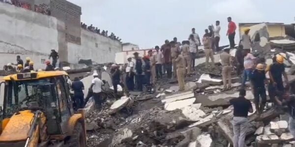 Seven people were killed when a six-storey building collapsed in Surat's industrial area yesterday