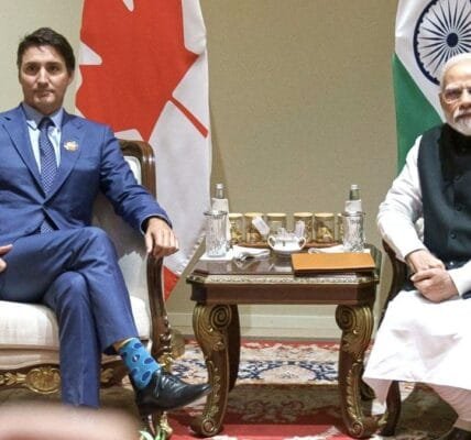 PM Narendra Modi meets Canadian PM Justin Trudeau in Laos