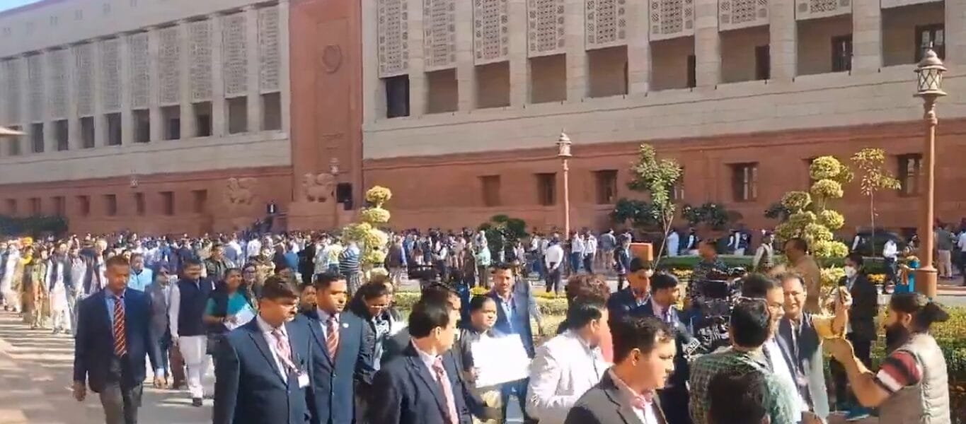 Opposition MPs today took out a protest march in the Parliament House complex over the issue of alleged bribery charges against the Adani Group