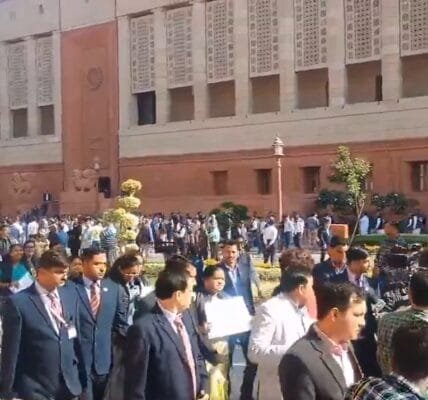 Opposition MPs today took out a protest march in the Parliament House complex over the issue of alleged bribery charges against the Adani Group