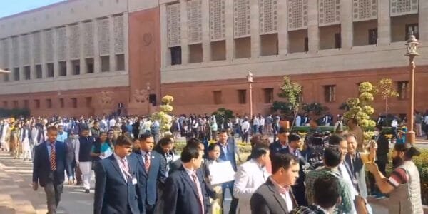 Opposition MPs today took out a protest march in the Parliament House complex over the issue of alleged bribery charges against the Adani Group