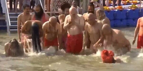 Home Minister Amit Shah took a holy dip in the Triveni at the Maha Kumbh in Prayagraj today