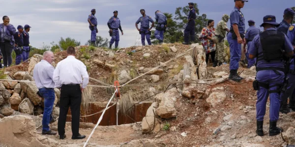 Rescuers pull out 36 bodies and 82 survivors from an illegal gold mine in South Africa