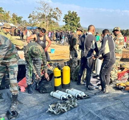 rescue workers trapped in coal mine in Assam