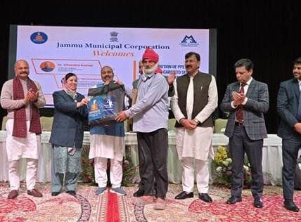 Union Minister Dr. Virendra Kumar distributes PPE kits and Ayushman cards to sewer and septic tank workers in Jammu under Namaste Scheme