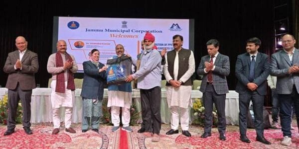 Union Minister Dr. Virendra Kumar distributes PPE kits and Ayushman cards to sewer and septic tank workers in Jammu under Namaste Scheme