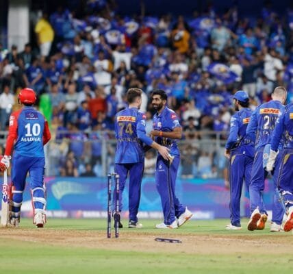 Mumbai Indians became the fourth team to reach the IPL playoffs by defeating Delhi Capitals by 59 runs