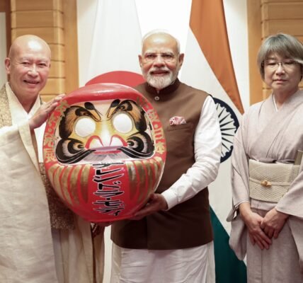 PM Modi was presented a Daruma doll by Seishi Hirose, Chief Priest of Shorinzan Daruma-ji Temple