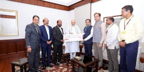 Repco Bank handed over dividend cheque of Rs 22.90 crore for the year 2024-25 to Union Home Minister Amit Shah