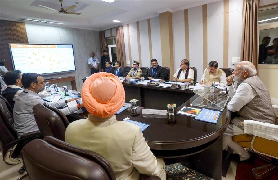 PM Modi visits Dehradun and holds a review meeting to assess the damage caused by floods in Uttarakhand