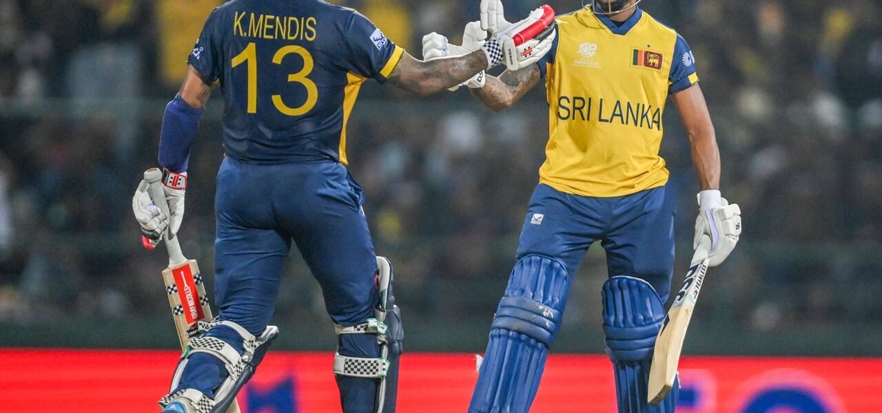 Sri Lanka defeated Australia by eight wickets in a Group B match of the T20 Cricket World Cup to qualify for the Super 8 stage.