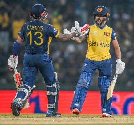 Sri Lanka defeated Australia by eight wickets in a Group B match of the T20 Cricket World Cup to qualify for the Super 8 stage.
