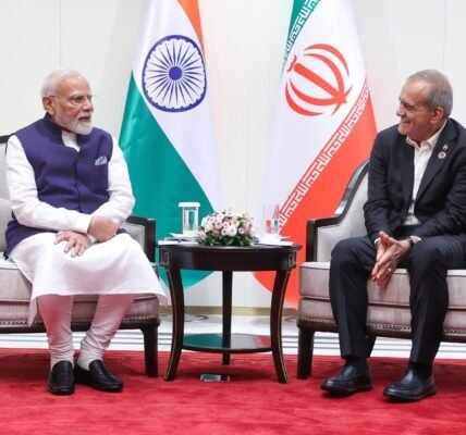 PM Modi meeting with the Iranian President during the SCO summit.