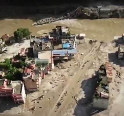 death toll from devastating floods in Nepal has risen to 392