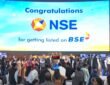 NSE shares listed at ₹1,800 per share against an issue price of ₹1,785 per share.