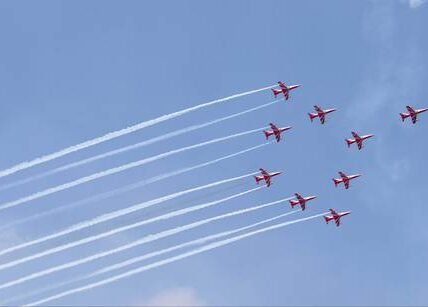 Suryakiran Aerobatic Team performs aerial stunts in the skies over Meerut for the first time.